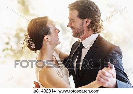 Bride and groom dancing View Large Photo Image Picture - Bride and groom dancing. Fotosearch