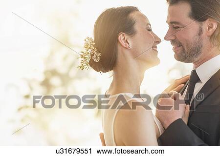 Bride and groom dancing View Large Photo Image Stock Image - Bride and groom dancing. Fotosearch