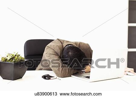 Businessman sleeping in office View Large Photo Image Stock Image - Businessman sleeping in office. Fotosearch
