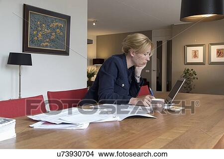 Businesswoman working art home View Large Photo Image Picture - Businesswoman working art home. Fotosearch