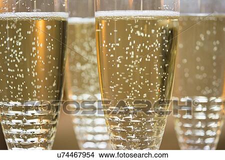 Picture - Close-up of champagne flutes. Fotosearch