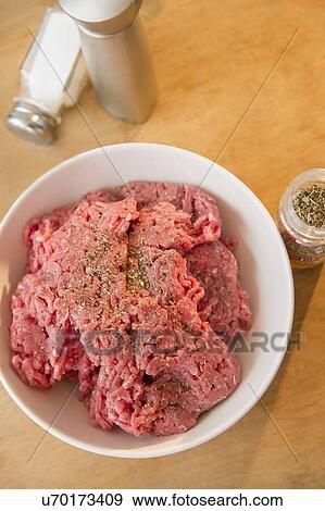 Close-up shot of peppered ground beef in white bowl View Large Photo Image Stock Photo - Close-up shot of peppered ground beef in white bowl. Fotosearch