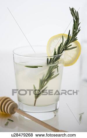 Cocktail with lemon slice View Large Photo Image Stock Photo - Cocktail with lemon slice. Fotosearch