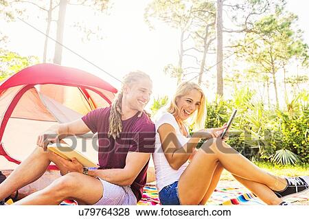 Coupe sitting in front of tent View Large Photo Image Stock Photo - Coupe sitting in front of tent. Fotosearch