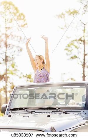 Stock Photo - Couple in car. Fotosearch