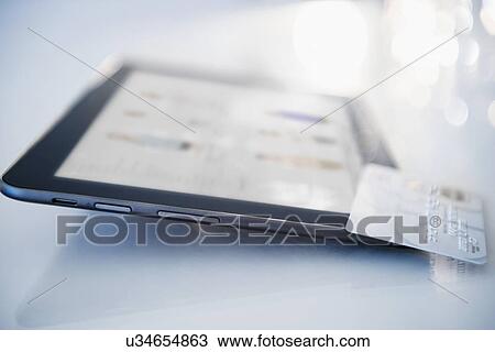 Digital tablet and credit card View Large Photo Image Stock Image - Digital tablet and credit card. Fotosearch