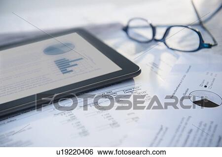 Digital tablet with stock market data View Large Photo Image Stock Photograph - Digital tablet with stock market data. Fotosearch