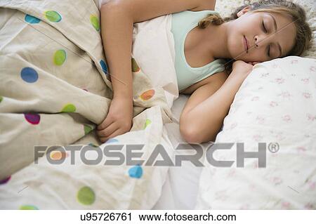 Girl (12-13) sleeping View Large Photo Image Stock Image - Girl (12-13) sleeping. Fotosearch