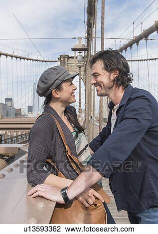 Happy couple on Brooklyn Bridge View Large Photo Image Stock Image - Happy couple on Brooklyn Bridge . Fotosearch