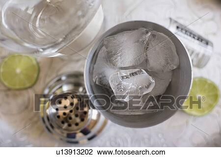 Ice cubes in shaker View Large Photo Image Stock Image - Ice cubes in shaker. Fotosearch