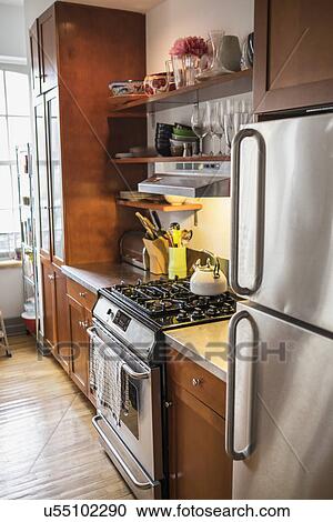 Stock Image - Interior of domestic kitchen. Fotosearch