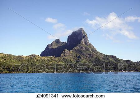 Landscape with rocky mountains and calm sea View Large Photo Image Stock Image - Landscape with rocky mountains and calm sea. Fotosearch