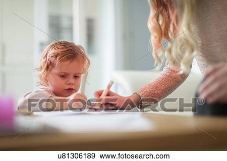 Stock Photo - Mother and daughter(2-3) drawing. Fotosearch