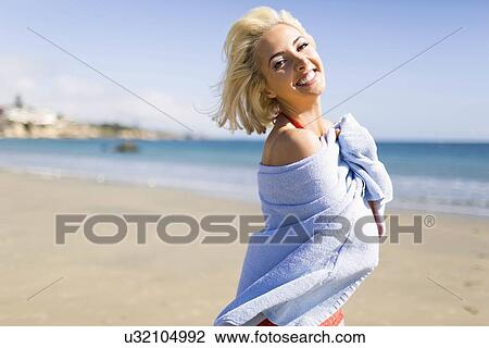 Portrait of blond woman on beach View Large Photo Image Stock Image - Portrait of blond woman on beach. Fotosearch