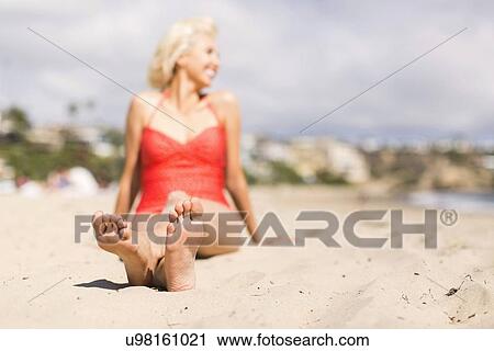 Portrait of blond woman on beach View Large Photo Image Stock Image - Portrait of blond woman on beach. Fotosearch