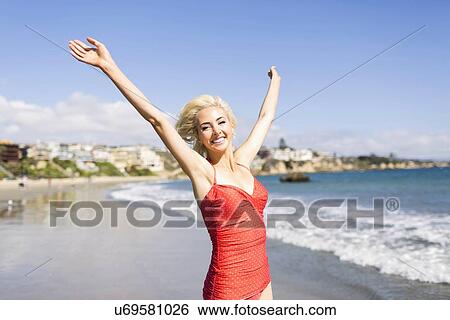 Portrait of blond woman on beach View Large Photo Image Stock Photograph - Portrait of blond woman on beach. Fotosearch