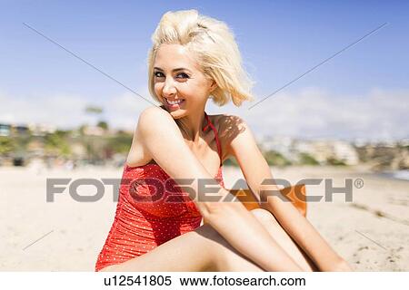 Portrait of blond woman on beach View Large Photo Image Stock Photography - Portrait of blond woman on beach. Fotosearch