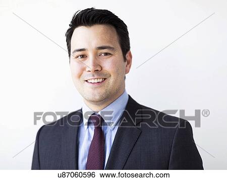 Stock Photograph - Portrait of businessman in suit. Fotosearch