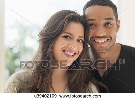 Stock Photo - Portrait of happy couple. Fotosearch