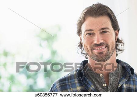 Stock Photo - Portrait of smiling man. Fotosearch