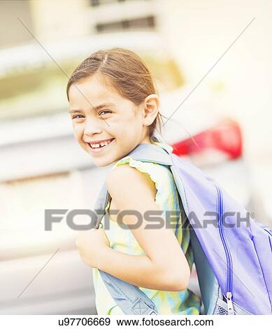 Portrait of smiling student (6-7) outdoors View Large Photo Image Stock Photo - Portrait of smiling student (6-7) outdoors. Fotosearch
