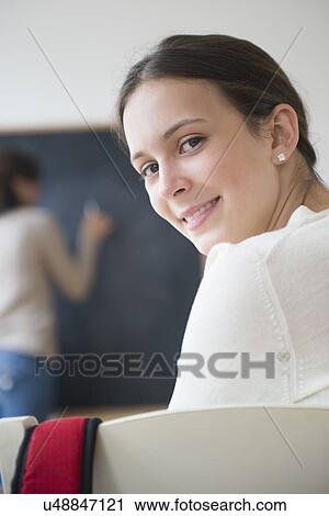 Portrait of teenage student (14-15) in classroom View Large Photo Image Stock Image - Portrait of teenage student (14-15) in classroom. Fotosearch