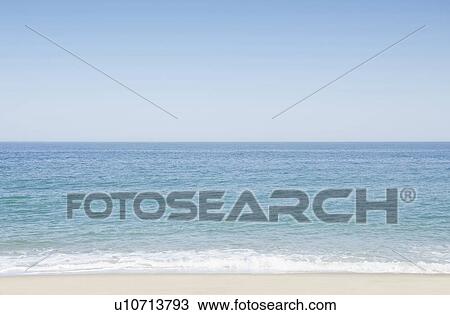 Seascape with surf on sandy beach View Large Photo Image Stock Image - Seascape with surf on sandy beach. Fotosearch
