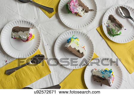 Slices of cake on plates View Large Photo Image Stock Image - Slices of cake on plates. Fotosearch