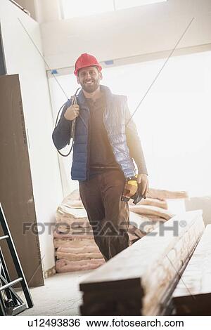 Smiling construction worker View Large Photo Image Stock Photograph - Smiling construction worker. Fotosearch