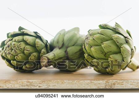 Studio shot of artichokes View Large Photo Image Stock Image - Studio shot of artichokes. Fotosearch