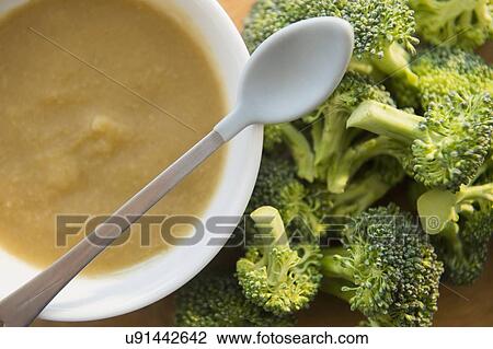 Stock Image - Studio shot of broccoli puree. Fotosearch