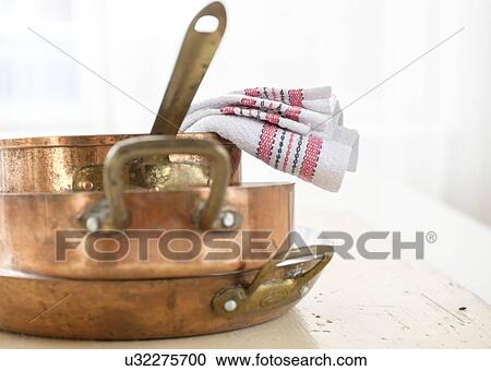 Studio shot of copper pans View Large Photo Image Stock Image - Studio shot of copper pans. Fotosearch