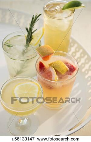 Stock Photo - Studio shot of drinks on tray. Fotosearch