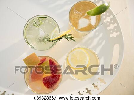 Stock Photo - Studio shot of drinks on tray. Fotosearch