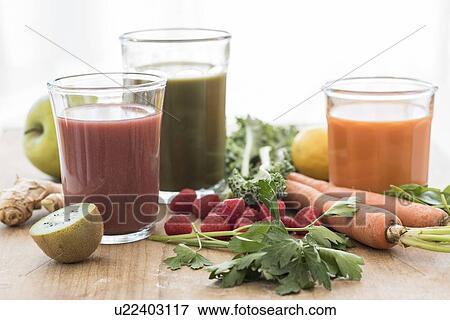 Studio shot of fruit and vegetable juices View Large Photo Image Stock Photo - Studio shot of fruit and vegetable juices. Fotosearch