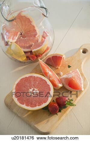 Studio shot of fruit cocktail preparation View Large Photo Image Stock Photograph - Studio shot of fruit cocktail preparation. Fotosearch