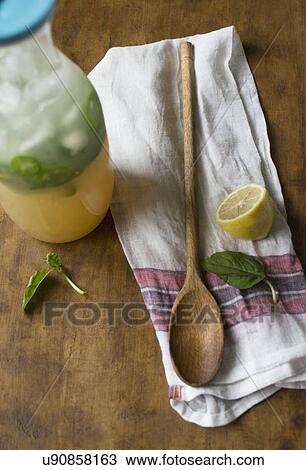 Stock Image - Studio shot of lemonade in bottle. Fotosearch