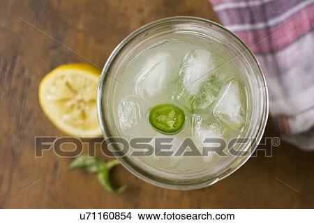 Picture - Studio shot of lemonade in jar. Fotosearch
