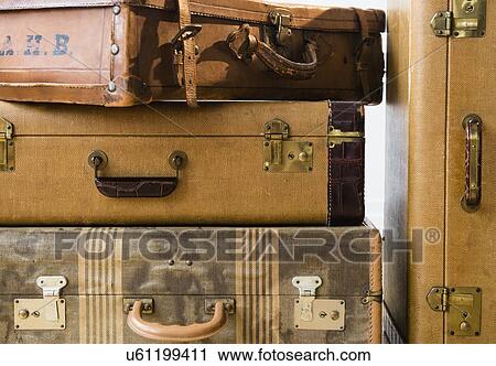 Stock Image - Studio shot of old fashioned suitcases. Fotosearch