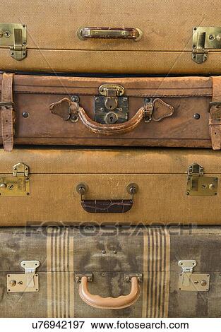 Stock Photo - Studio shot of old fashioned suitcases. Fotosearch