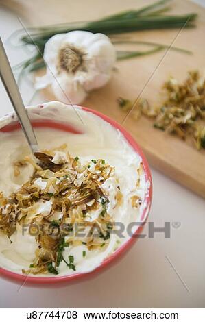 Studio shot of onion dip View Large Photo Image Stock Photo - Studio shot of onion dip. Fotosearch