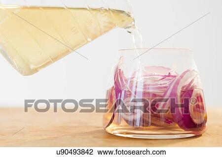 Studio shot of pickled onions View Large Photo Image Stock Image - Studio shot of pickled onions. Fotosearch