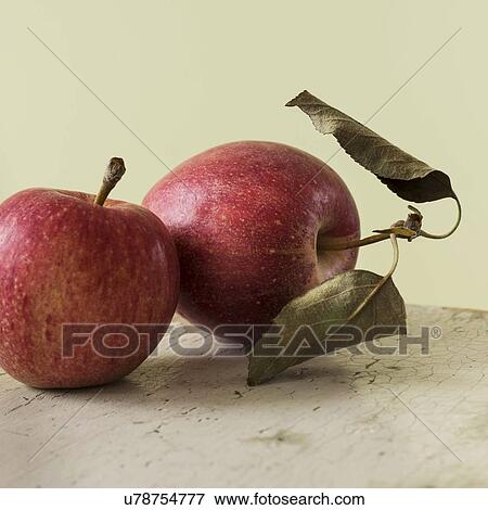 Stock Photo - Studio shot of red apples. Fotosearch