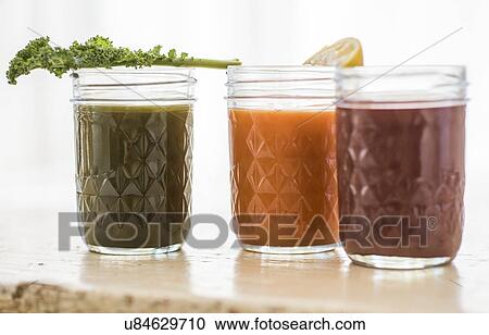 Studio shot of vegetable juices View Large Photo Image Stock Image - Studio shot of vegetable juices. Fotosearch