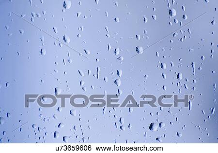 Studio shot of water drops on glass View Large Photo Image Stock Photograph - Studio shot of water drops on glass. Fotosearch