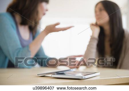 Teenage girl (14-15) listening to lecture at home View Large Photo Image Stock Photo - Teenage girl (14-15) listening to lecture at home. Fotosearch