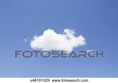 Stock Photo - White cumulus cloud in clear blue sky. Fotosearch