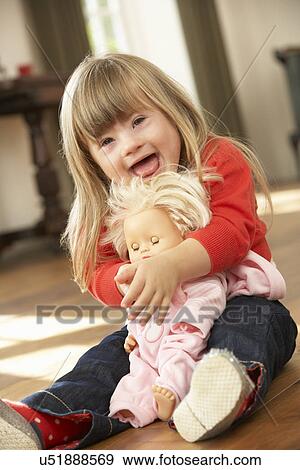 3 year old girl with Downs Syndrome View Large Photo Image Stock Photo - 3 year old girl with Downs Syndrome. Fotosearch