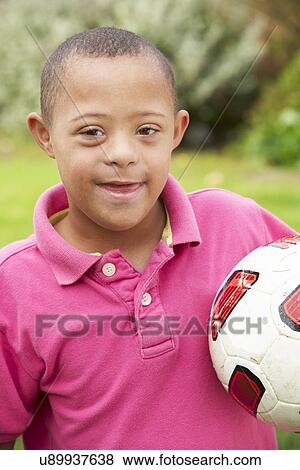 4 year old boy with Downs Syndrome View Large Photo Image Stock Photo - 4 year old boy with Downs Syndrome. Fotosearch