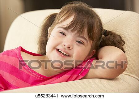 6 year old girl with Downs Syndrome View Large Photo Image Stock Image - 6 year old girl with Downs Syndrome. Fotosearch